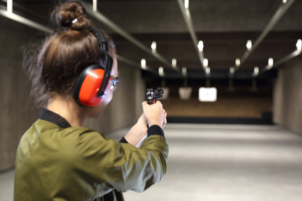 Female target shooting