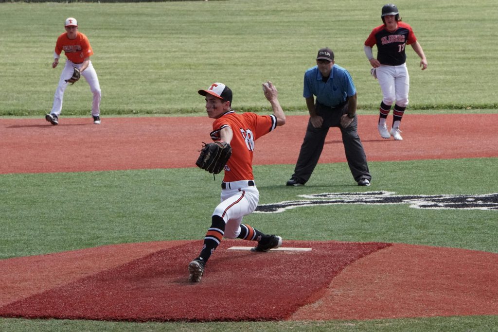professional baseball player showing a cutter grip during a game
