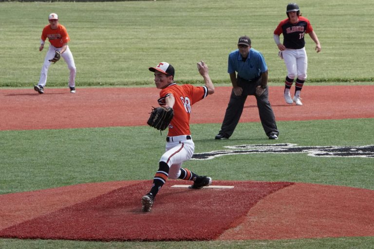 professional baseball player showing a cutter grip during a game